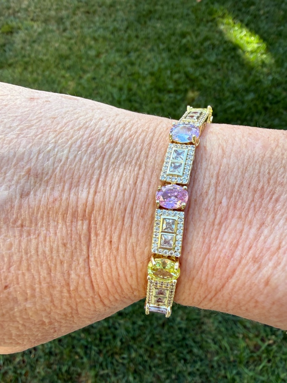 Gold Bracelet with pastel gems in Pink, Purple and Yellow